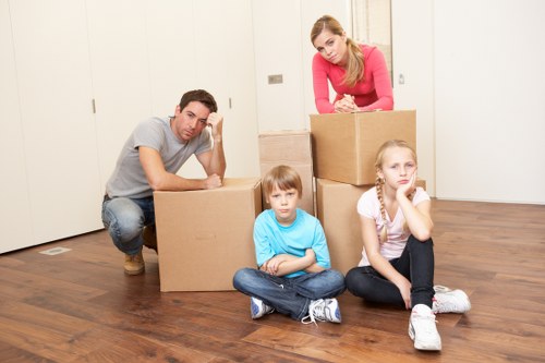 Professional movers transporting commercial assets