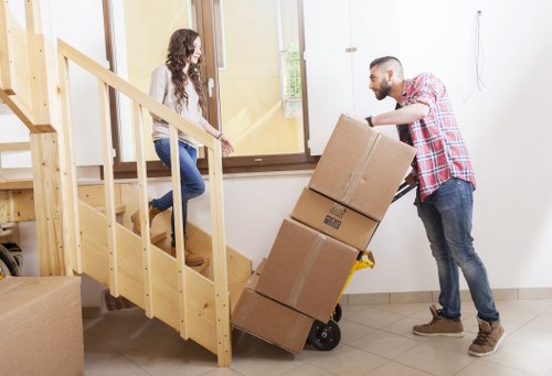 Professional movers handling furniture